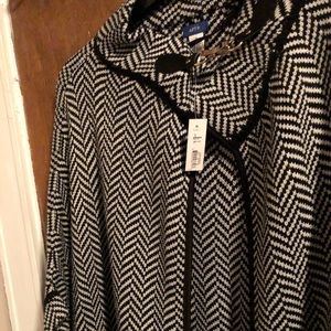 Blacks and white cape/coat with sleeves